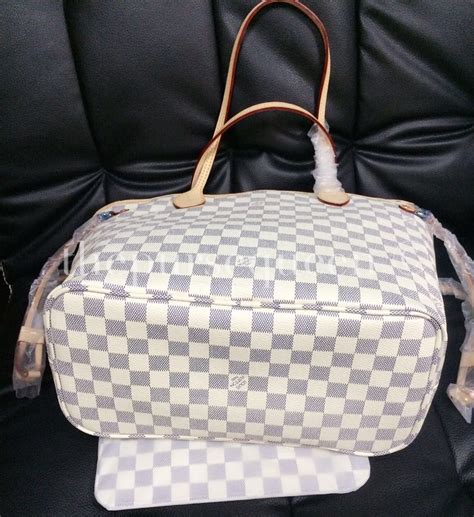 fake neverfull louis vuitton bag|authenticating a louis vuitton bag.